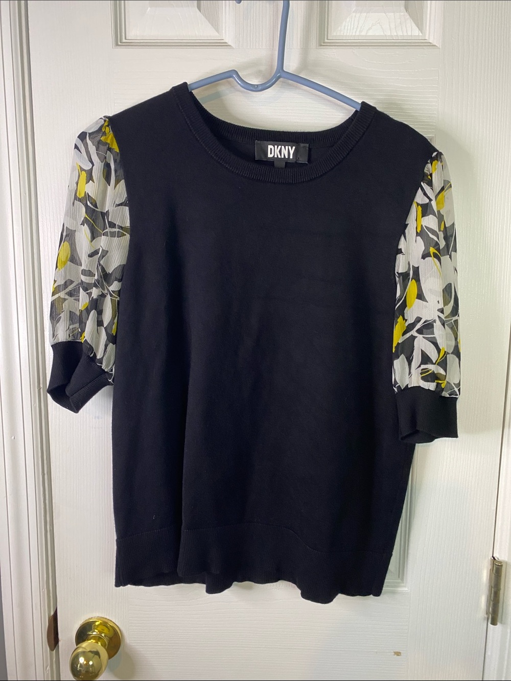 DKNY Black Knit Top with Yellow and Gray Floral Sheer Sleeves Size Large.